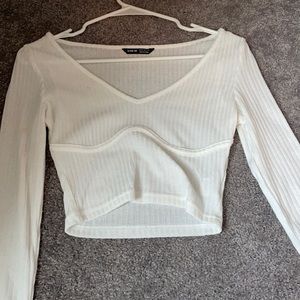 White crop long sleeve shirt.
